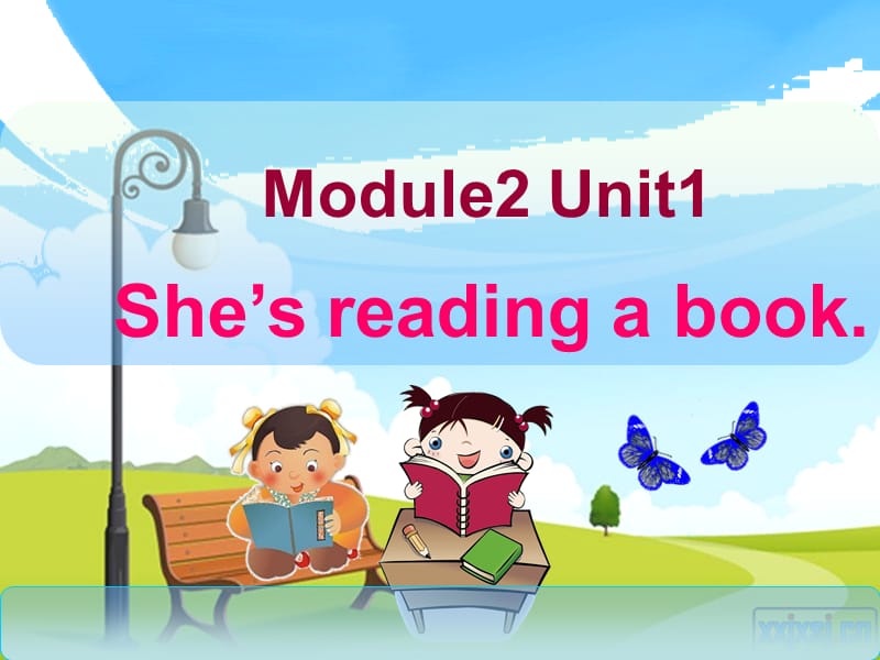 四上M2U1She's-reading-a-book.ppt_第1页